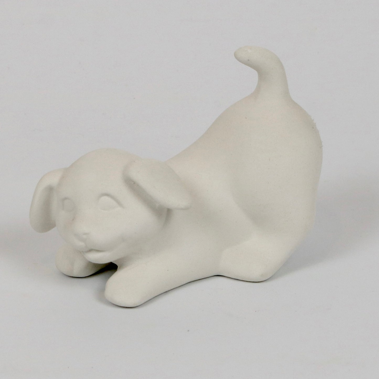 Hundebaby spielend