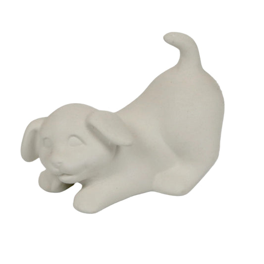 Hundebaby spielend aus Keramik zum Bemalen