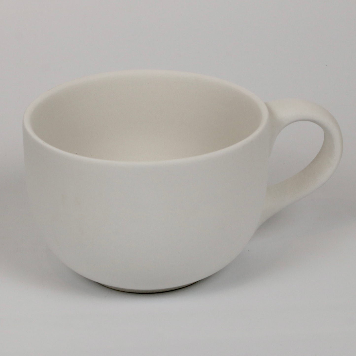 große flache Tasse